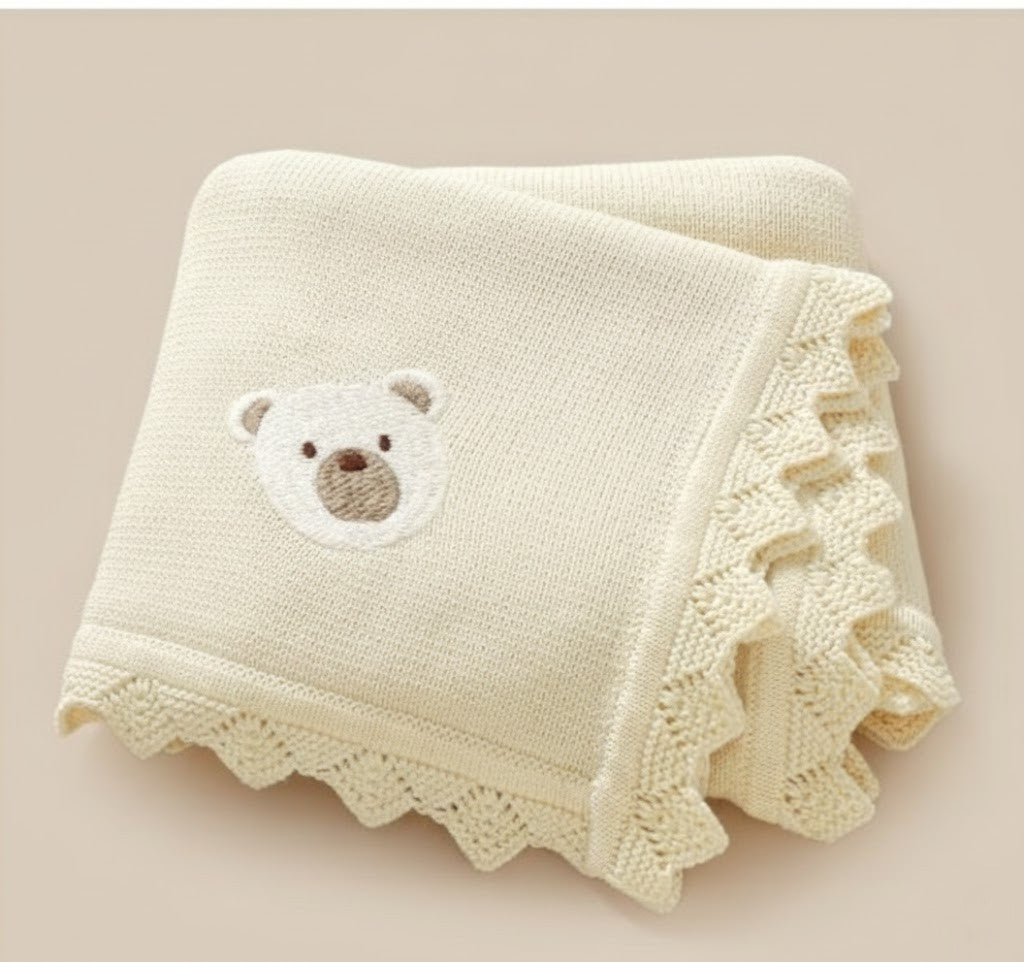 Stickad babyfilt i bomull