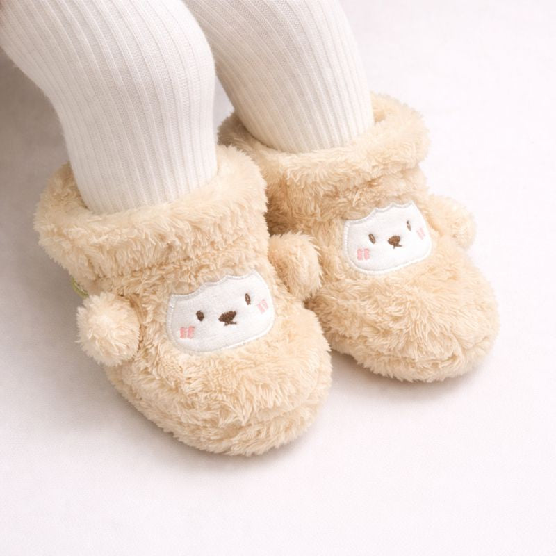 FÅR Babytofflor i Fuskpäls
