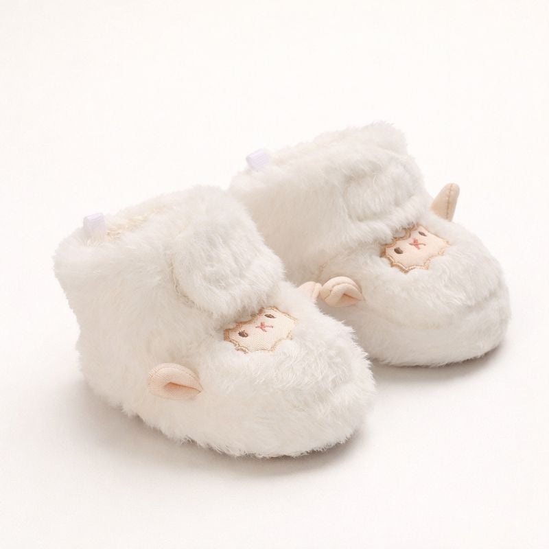FÅR Babytofflor i Fuskpäls