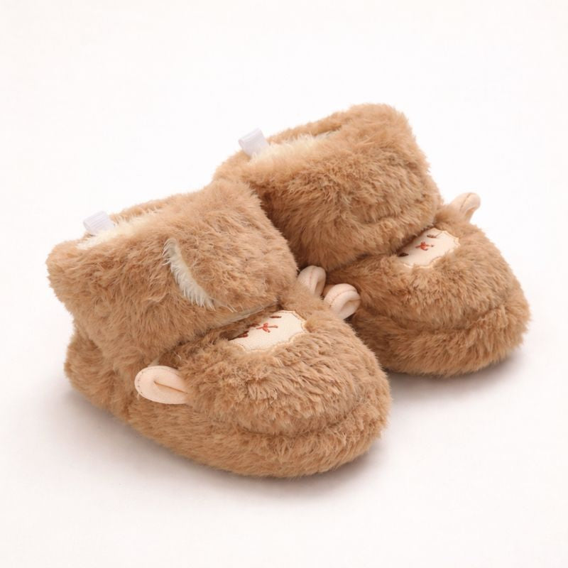 FÅR Babytofflor i Fuskpäls