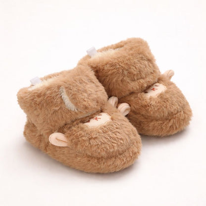 FÅR Babytofflor i Fuskpäls
