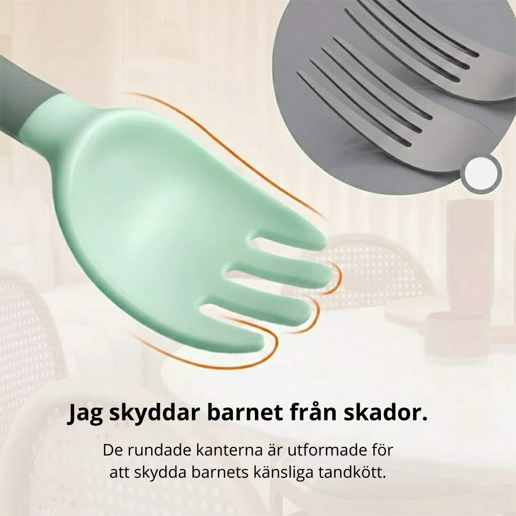 Träningssked för små barn händer