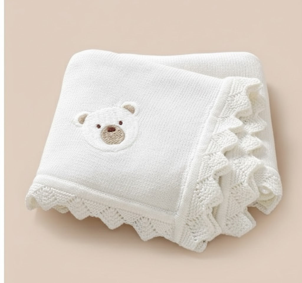 Stickad babyfilt i bomull