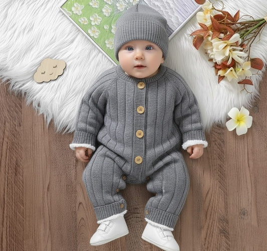 Stickad babyoverall jumpsuit
